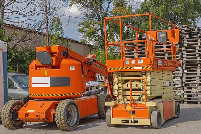 industrial forklift in use at a fully-stocked warehouse in Chelmsford